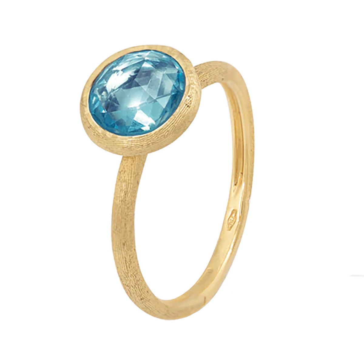 Blue topaz yellow gold on sale ring