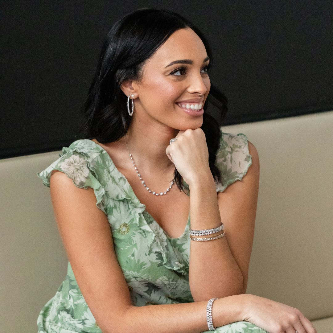Woman in Green Dress Wearing Dainty Silver Jewelry Set