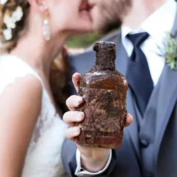 wedding bottle in hand