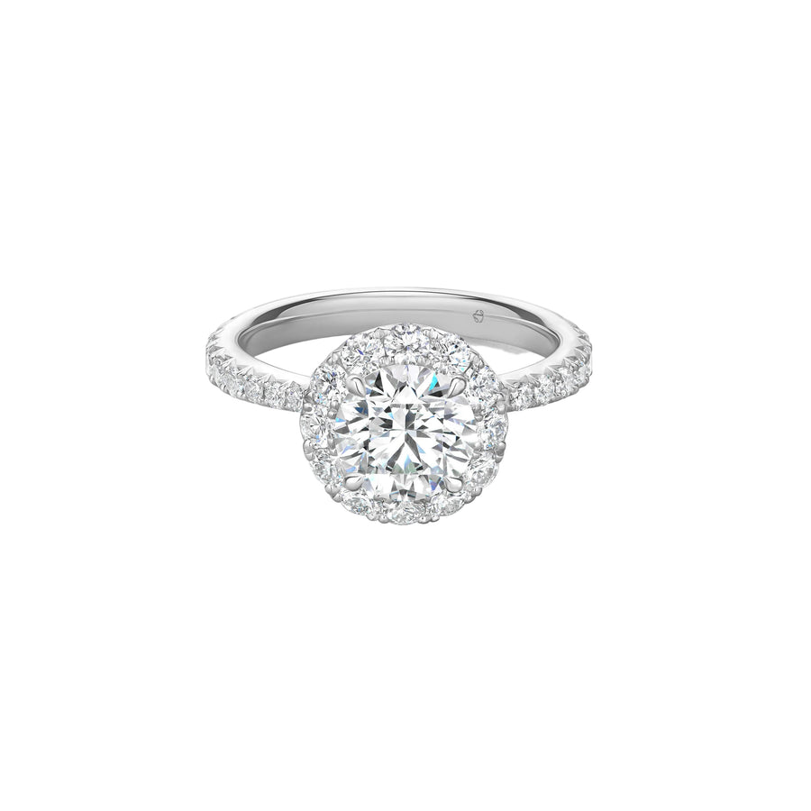 Vela 0.74ct Round Brilliant Diamond and 0.65ct Diamond Halo Ring in Platinum, size 6.5