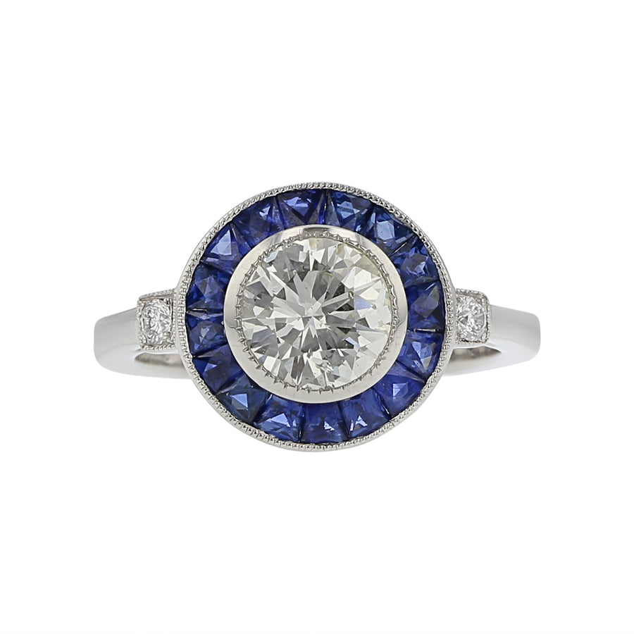 1.06ct Round Diamond, 0.99ct French Cut Sapphire, and 0.07ct Diamond Halo Ring in Platinum