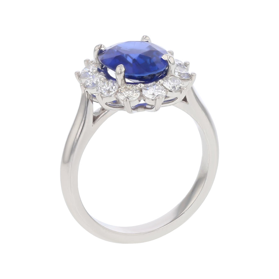 3.12ct Oval Sri Lankan Royal Blue Sapphire (H) DGL and 0.97ct Full Cut Diamonds FG/VS Halo Ring in Platinum