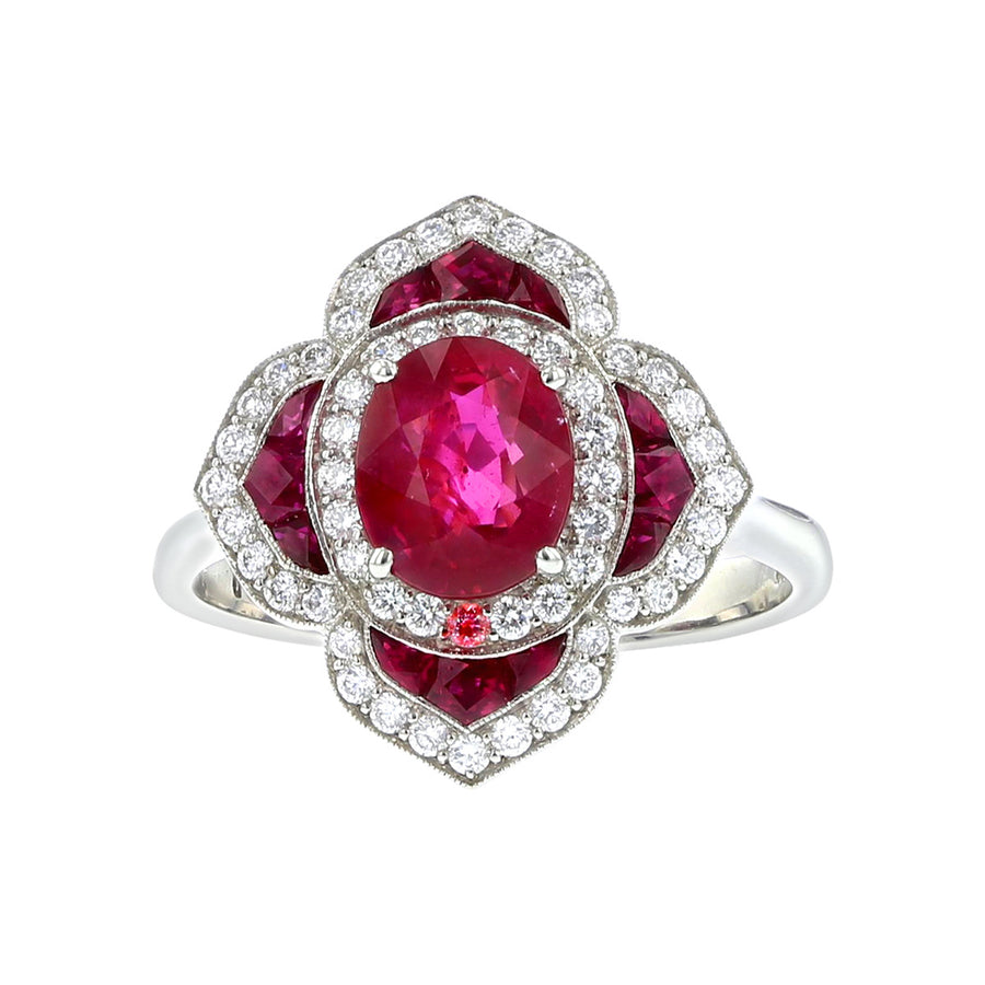 Platinum Oval Ruby and Diamond Halo Ring