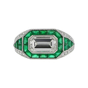 Platinum Emerald-cut Diamond and Emerald Halo Ring