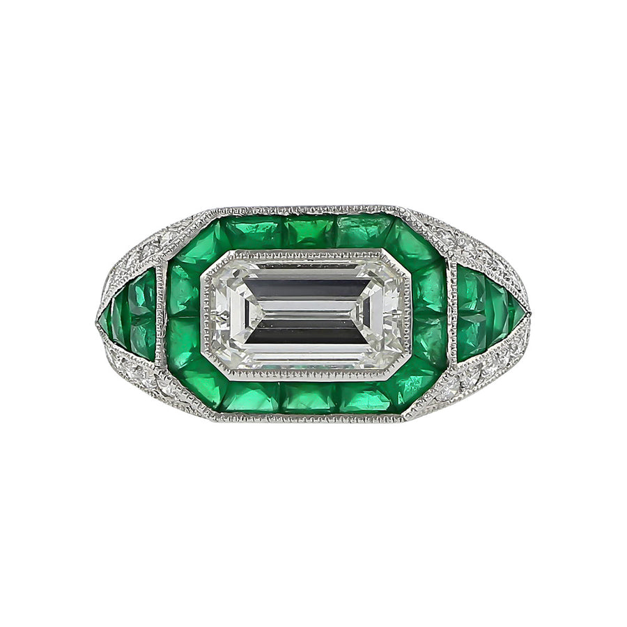 Platinum Emerald-cut Diamond and Emerald Halo Ring
